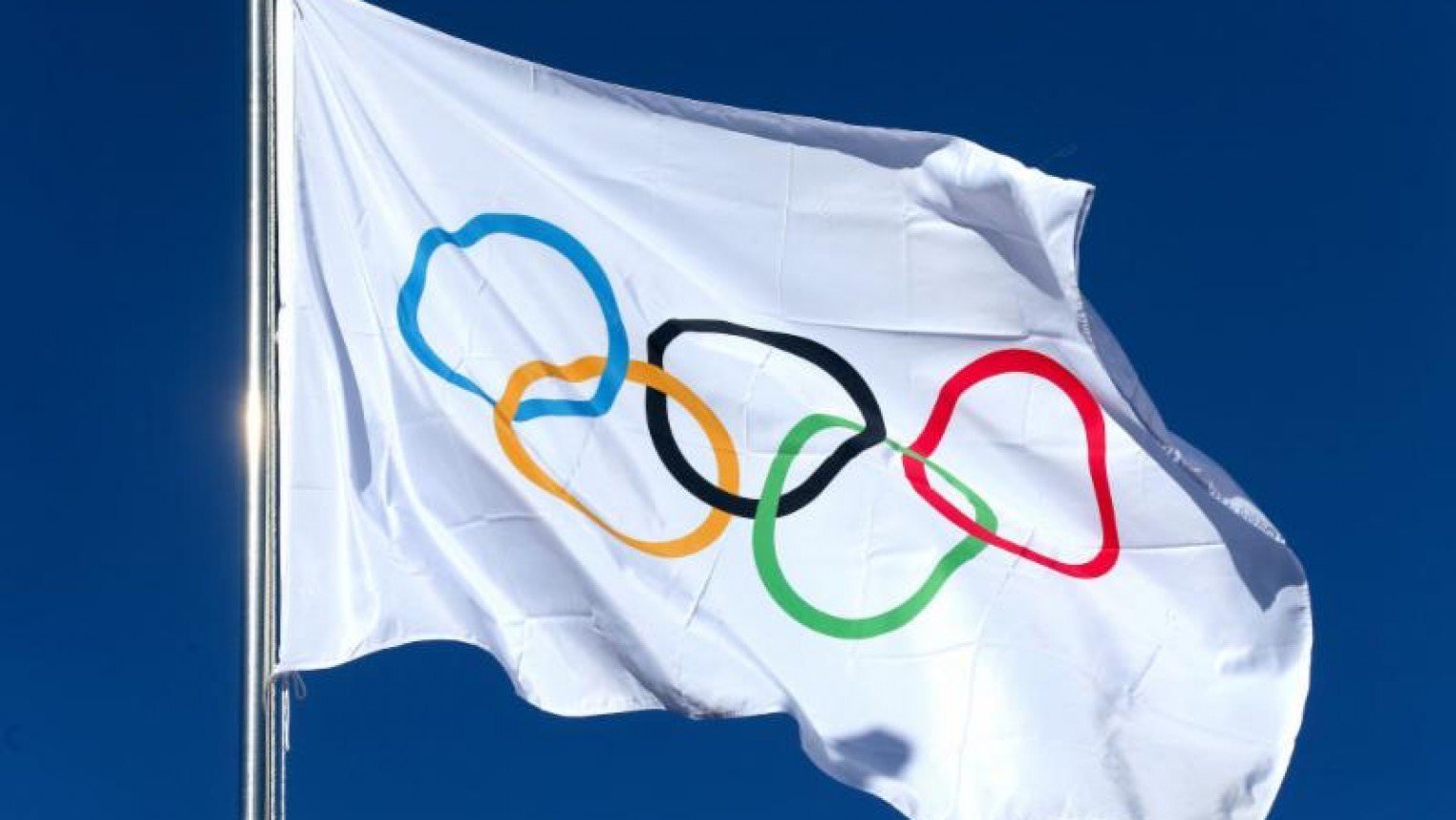 Olympic flag. Олимпийские игры Олимпийский флаг. Флаг международного олимпийского комитета. Олимпийский флаг 1988. Олимпийский флаг фото.